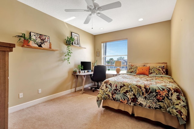 carpeted bedroom with ceiling fan, baseboards, and recessed lighting