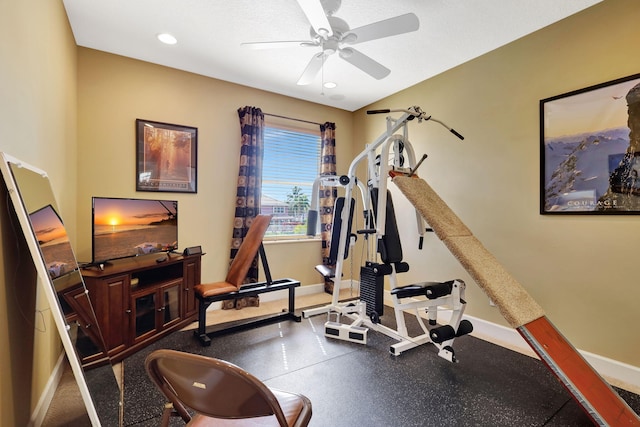 exercise room featuring ceiling fan