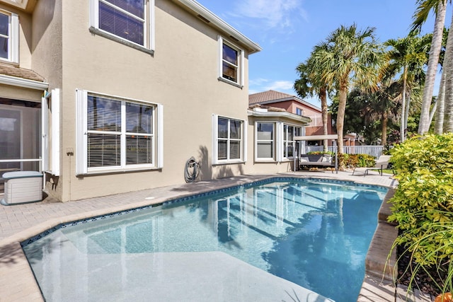 view of swimming pool featuring a gazebo