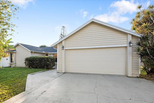 garage with a yard