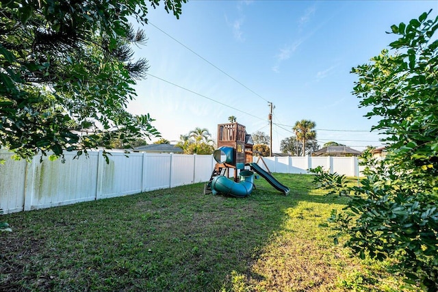 view of play area with a yard