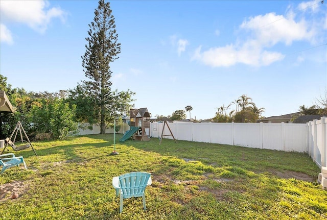 view of yard featuring a playground