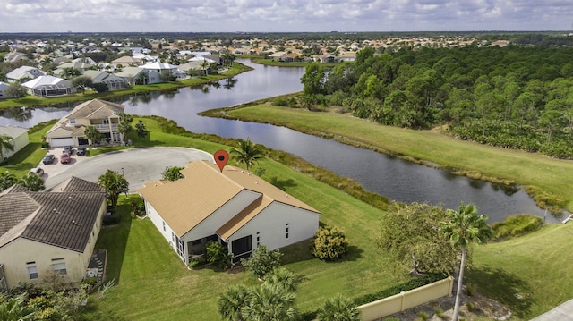 aerial view with a residential view and a water view