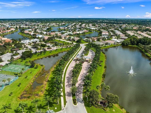 bird's eye view featuring a water view and a residential view