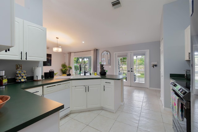 kitchen with french doors, dishwasher, kitchen peninsula, a healthy amount of sunlight, and white cabinets