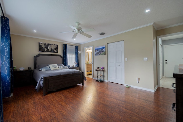 bedroom featuring crown molding, dark wood-type flooring, and ceiling fan