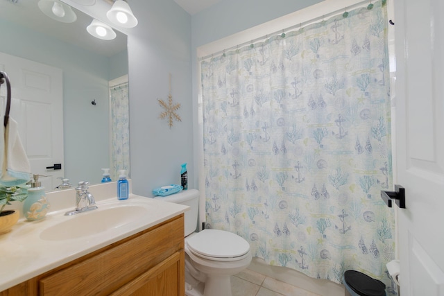 bathroom featuring vanity, tile patterned floors, toilet, and a shower with shower curtain