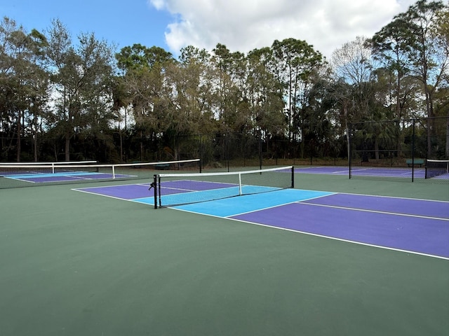 view of tennis court with basketball court