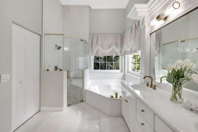 bathroom with tile patterned floors, vanity, plus walk in shower, and ornamental molding