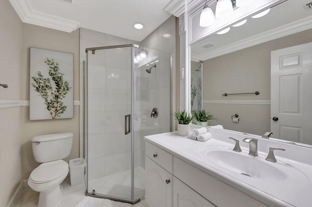 bathroom with crown molding, a shower with shower door, and toilet