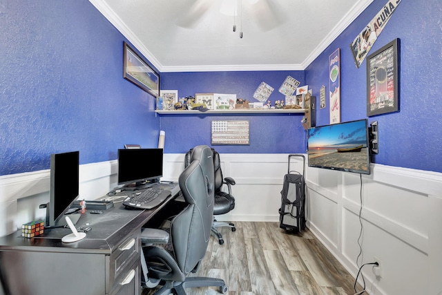 office space with ceiling fan, ornamental molding, and wood-type flooring