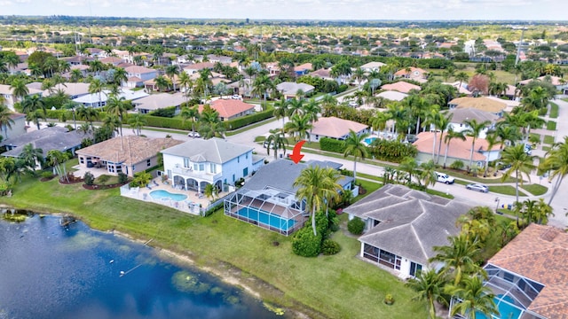 drone / aerial view featuring a water view