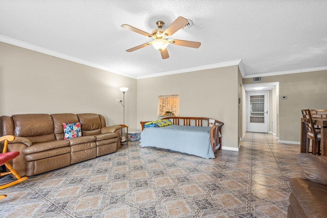 bedroom featuring ceiling fan, crown molding, and a textured ceiling