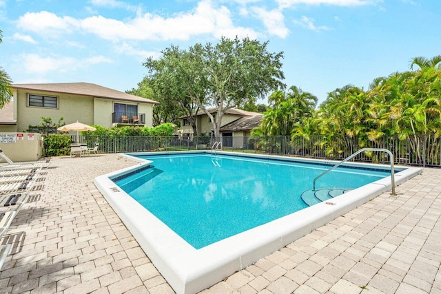 view of pool featuring a patio