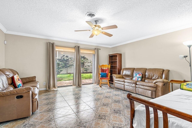 living room with crown molding, ceiling fan, and a textured ceiling