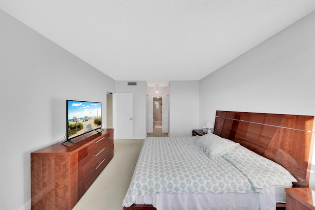 bedroom with carpet and lofted ceiling