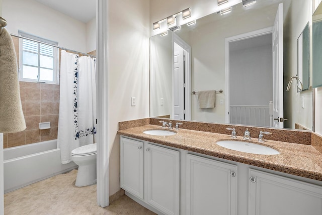 full bathroom featuring shower / tub combo with curtain, toilet, vanity, and tile patterned flooring