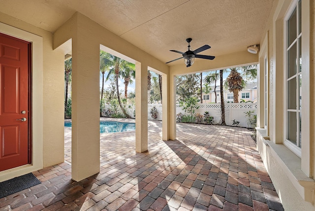 view of patio with ceiling fan