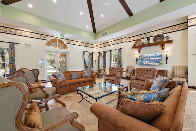 living room with beamed ceiling and a towering ceiling