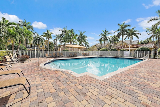 view of pool featuring a patio