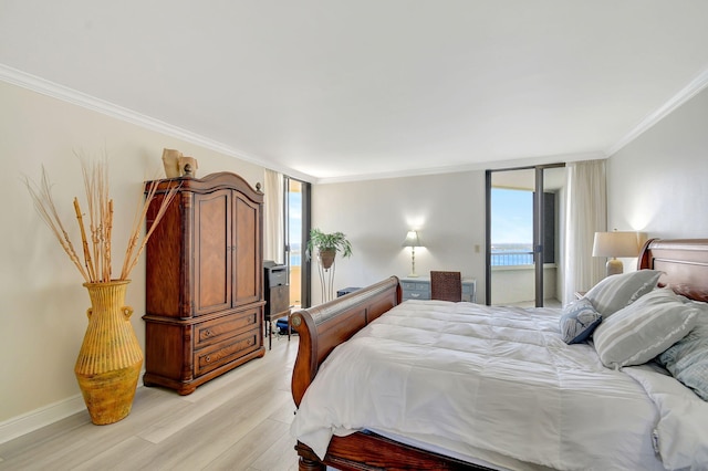 bedroom with ornamental molding, light hardwood / wood-style floors, and access to outside