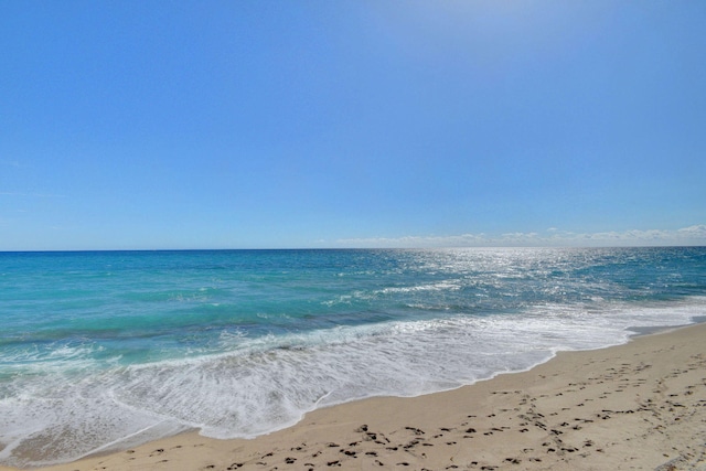 property view of water featuring a view of the beach