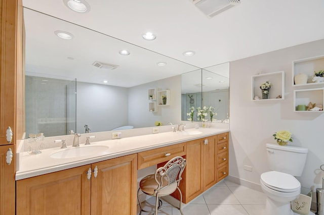 5080 N Ocean Dr Unit 20C, Riviera Beach, FL 33404 - bathroom featuring toilet, tile patterned flooring, an enclosed shower, double vanity, and recessed lighting