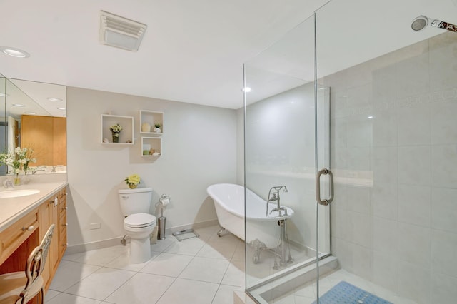 5080 N Ocean Dr Unit 20C, Riviera Beach, FL 33404 - bathroom with a stall shower, vanity, a freestanding bath, tile patterned floors, and toilet