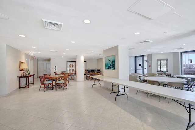 dining area featuring light tile patterned floors