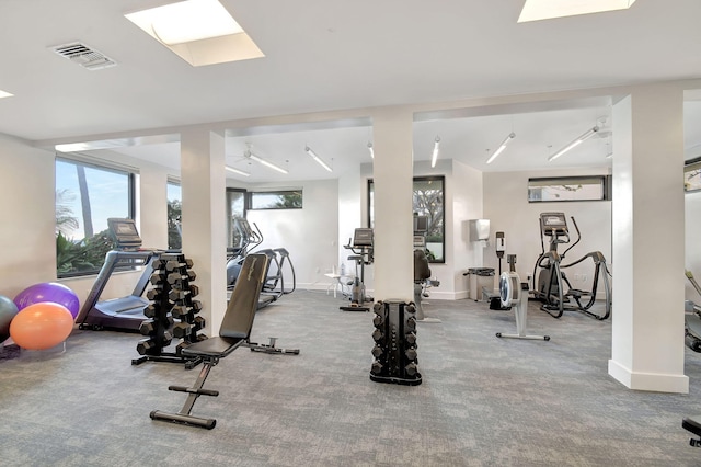 5080 N Ocean Dr Unit 20C, Riviera Beach, FL 33404 - exercise room featuring carpet and baseboards