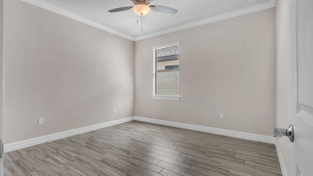 spare room with crown molding, light hardwood / wood-style flooring, and ceiling fan