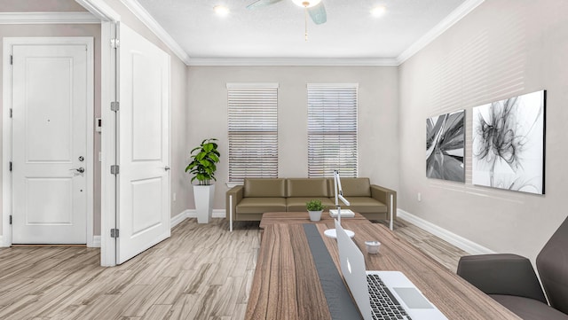 living room with crown molding, ceiling fan, and light hardwood / wood-style floors