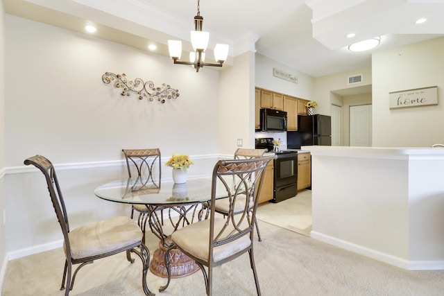 dining space featuring ornamental molding, light colored carpet, and a notable chandelier