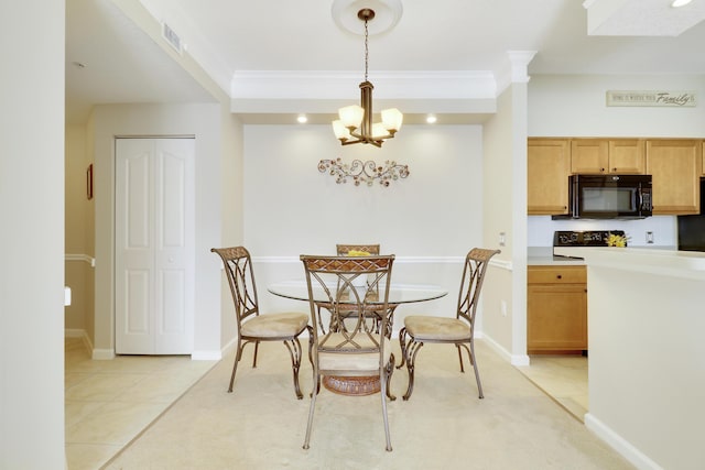 dining space featuring light tile patterned flooring, ornamental molding, and an inviting chandelier