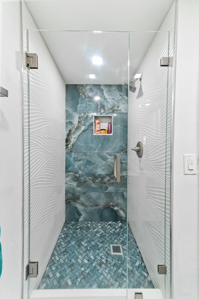 bathroom featuring walk in shower