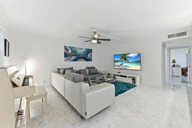 living room featuring ceiling fan and ornamental molding