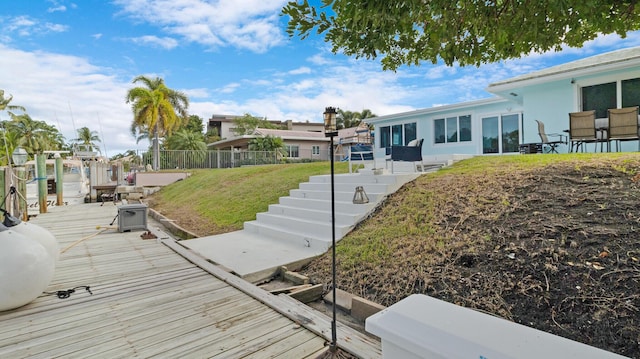 dock area with a lawn