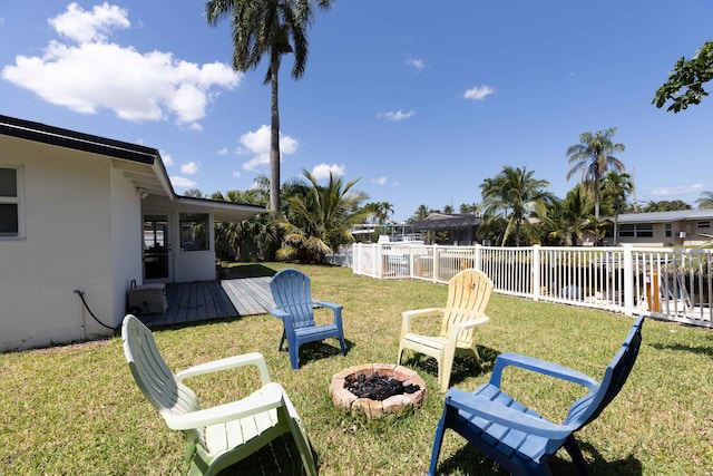 view of yard featuring a fire pit