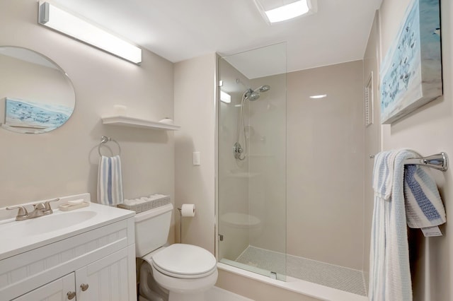 full bathroom with vanity, toilet, and walk in shower