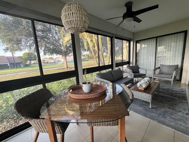 5659 Fairway Park Dr Unit 101, Boynton Beach, FL 33437 - sunroom with ceiling fan and an outdoor hangout area