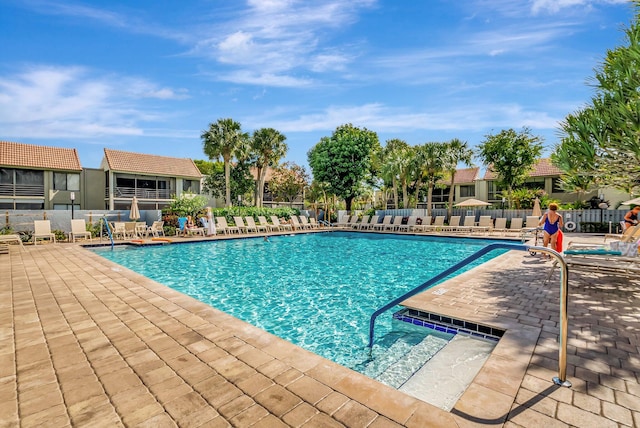 view of swimming pool featuring a patio area