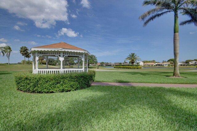 5659 Fairway Park Dr Unit 101, Boynton Beach, FL 33437 - view of home's community with a gazebo and a lawn