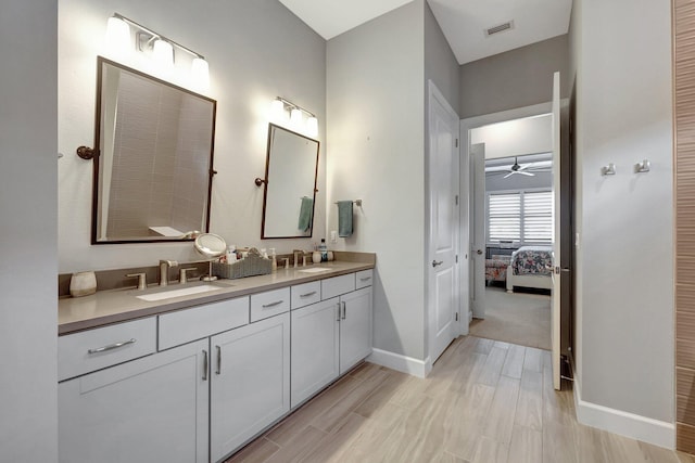 bathroom with vanity and ceiling fan