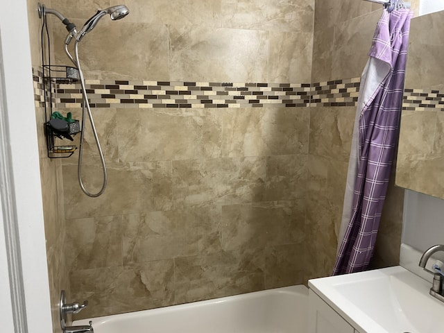 bathroom featuring sink and shower / tub combo with curtain