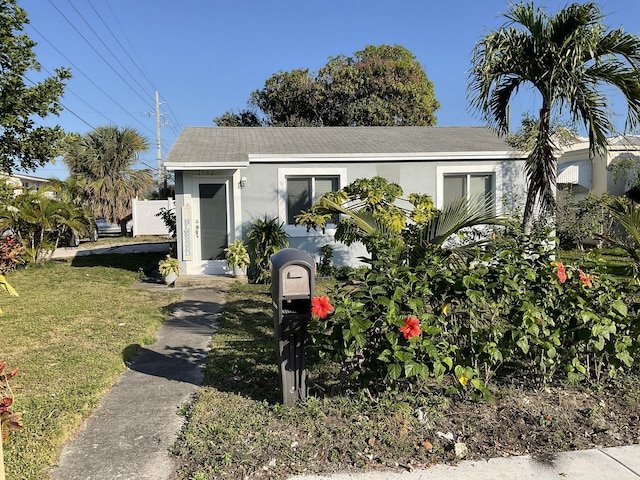 view of front of home with a front yard