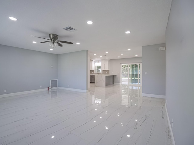 empty room featuring ceiling fan