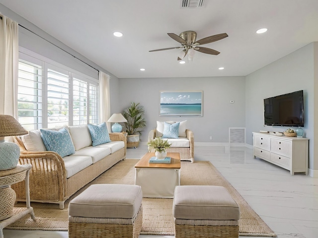 living room featuring ceiling fan