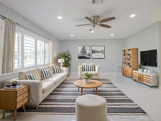 living room with ceiling fan