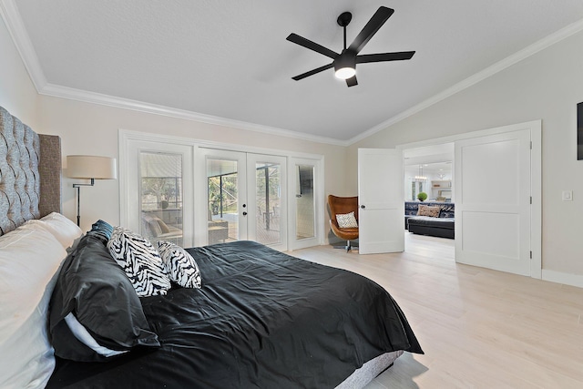 bedroom with french doors, lofted ceiling, access to outside, ornamental molding, and light hardwood / wood-style floors