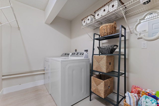 laundry area featuring independent washer and dryer